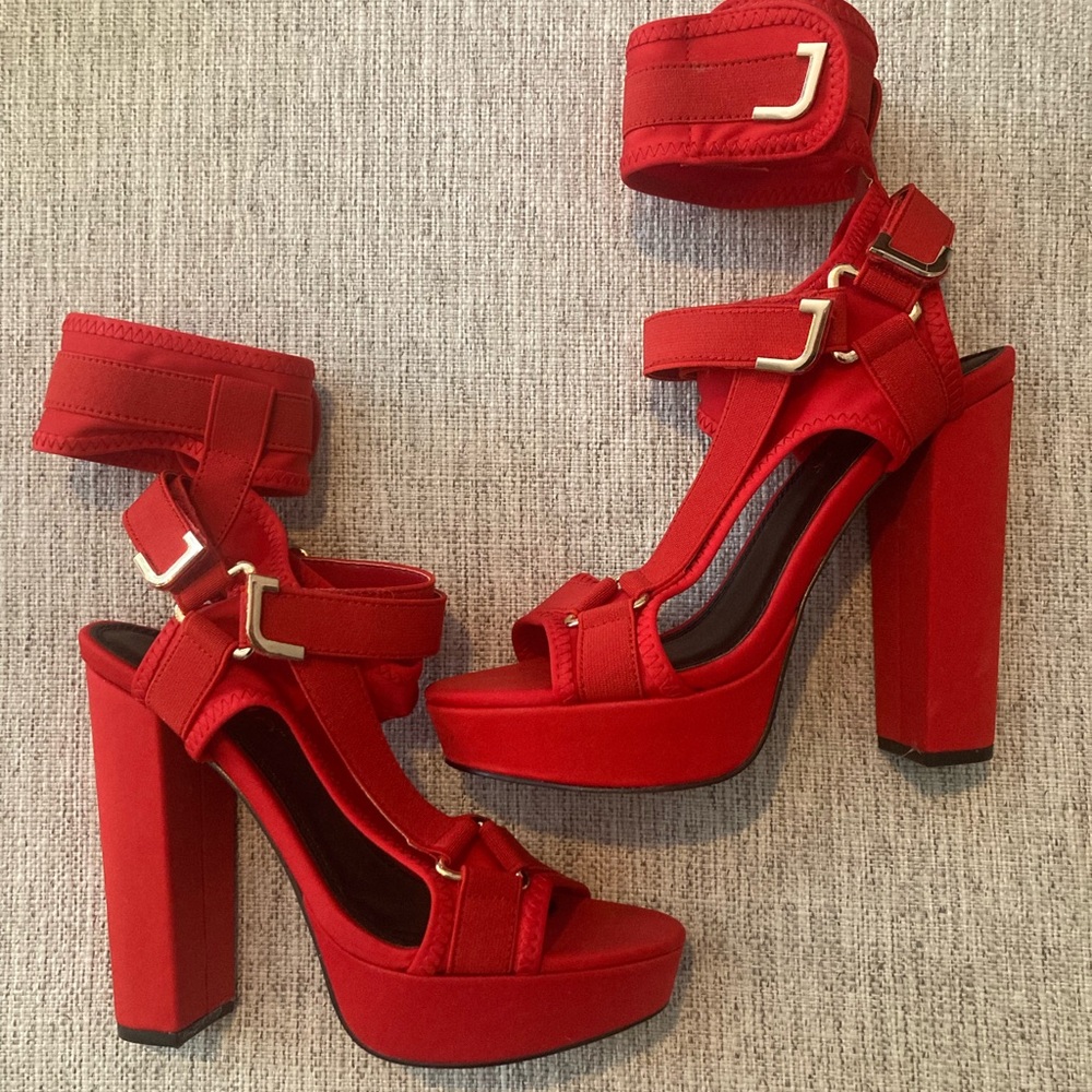 RED GLAMROCK HEELS- NEW NEVER WORN!!! Size 8 but runs small (more like 7- 7.5)